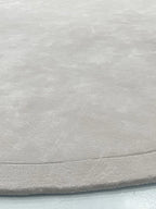 Linien Round Area Rug