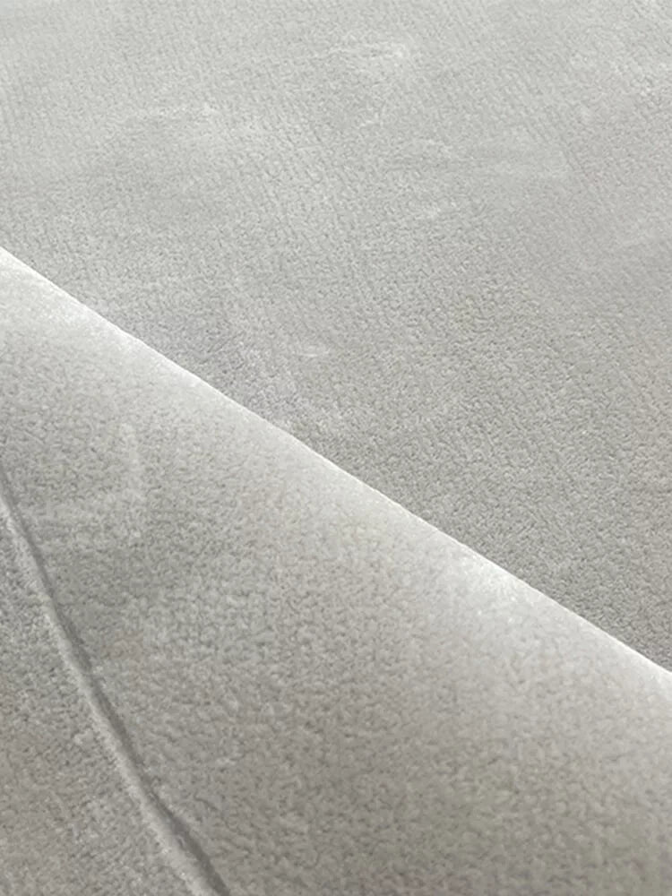 Linien Round Area Rug