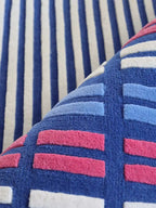 Checkered blue tufted rug