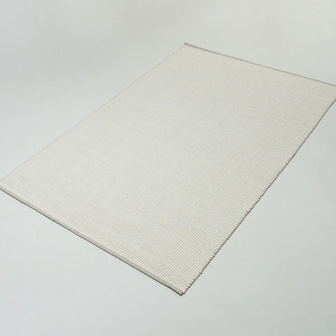 Tapis en pure laine tissée à la main
