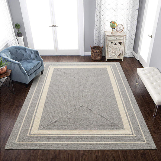 Tapis fait main tressé marron en laine